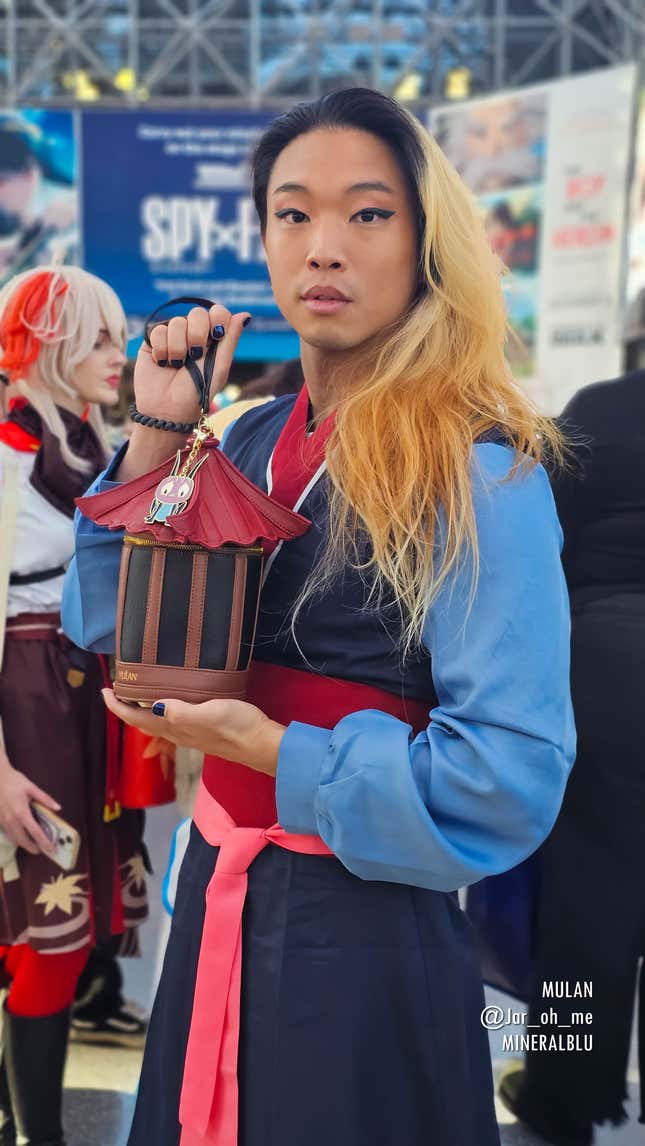 A Mulan cosplayer poses at Anime NYC 2023.