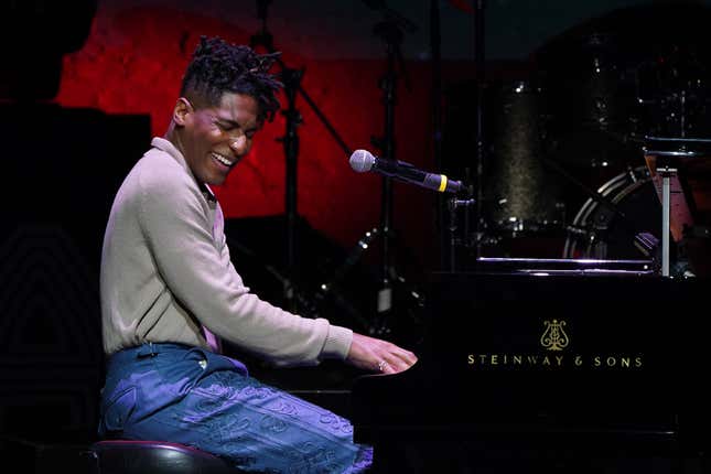 NEW YORK, NEW YORK - DECEMBER 05: Jon Batiste performs onstage during The Root 100 2023 at The Apollo Theater on December 05, 2023 in New York City.