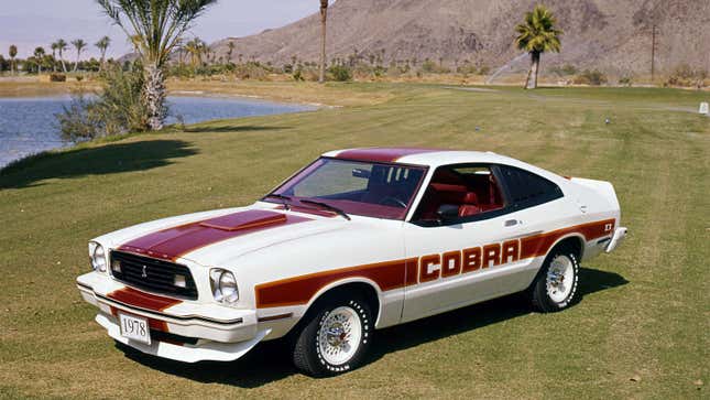 A photo of a white and red Ford Mustang MKII