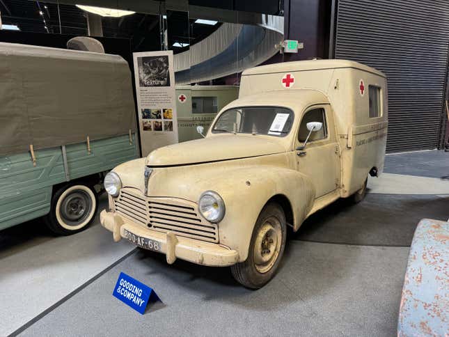 Front 3/4 view of a beige 1953 Peugeot Type 203 S3 Ambulance