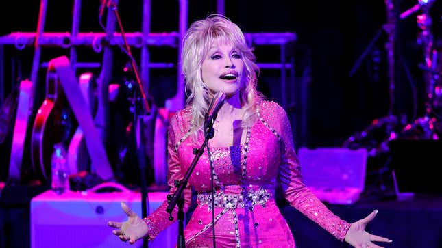 NASHVILLE, TENNESSEE - OCTOBER 24: Dolly Parton performs at the 2021 Kiss Breast Cancer Goodbye Concert at CMA Theater at the Country Music Hall of Fame and Museum on October 24, 2021 in Nashville, Tennessee. (Photo by Jason Kempin/Getty Images)