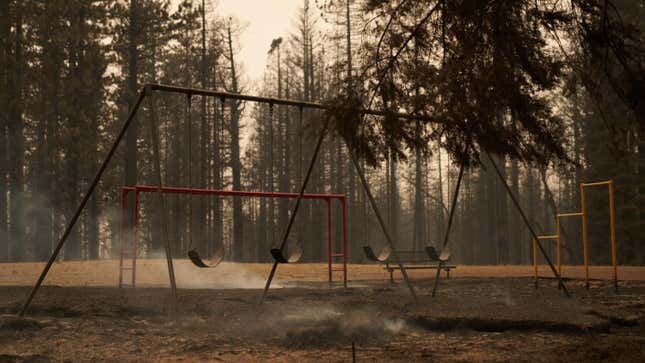 A partially burnt playground still smolders at Walt Tyler Elementary School in Grizzly Flats, California.