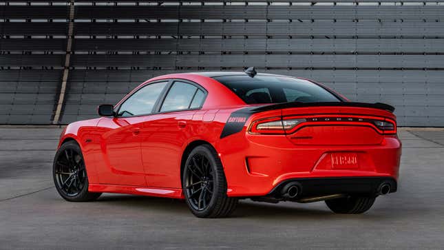 A photo of a red Dodge Charger muscle car. 