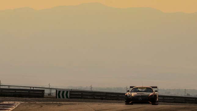 A photo of a Mercedes race car on track in Utah. 