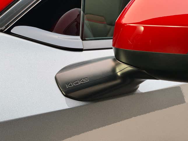 Side mirror detail of a 2025 Nissan Kicks