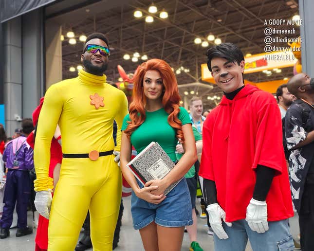 A trio of cosplayers dressed as characters from the animated film A Goofy Movie look into the camera.