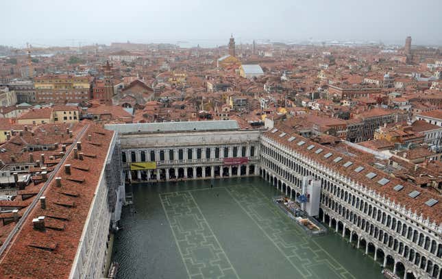 The iconic Saint Mark Square is completely submerged.