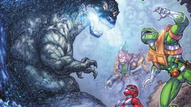 The Green and Red Rangers stare up at the enraged Godzilla, who's about to fire his radioactive breath.