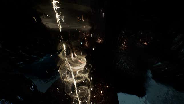 Lune slides down into a cavern on a rope made of light.