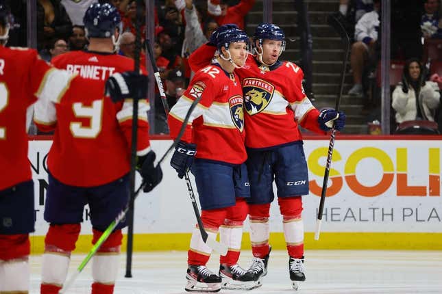 Apr 16, 2024; Sunrise, Florida, USA; Florida Panthers center Carter Verhaeghe (23) celebrates with defenseman Gustav Forsling (42) after scoring against the Toronto Maple Leafs at Amerant Bank Arena.
