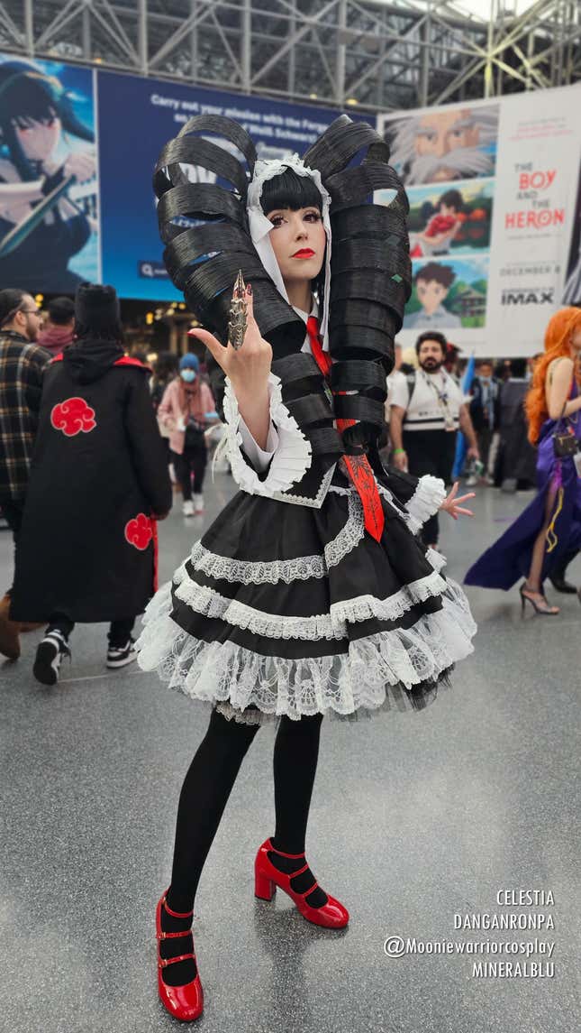A cosplayer poses dressed as Celestia at Anime NYC 2023.