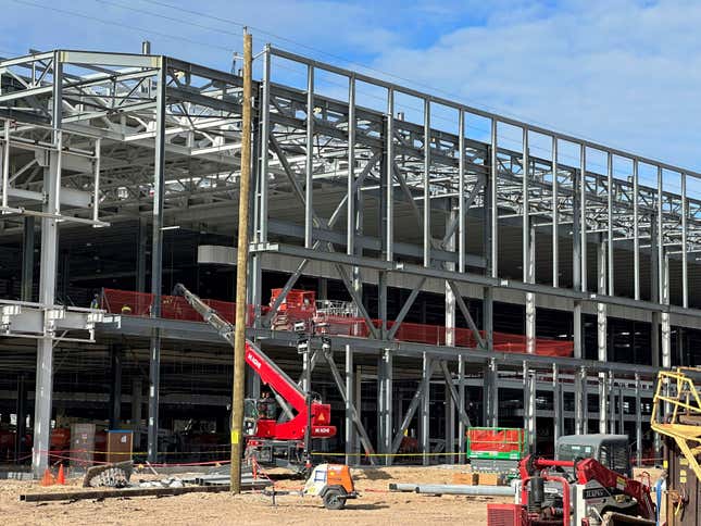 A factory building is under construction at Hyundai&#39;s first U.S. plant for manufacturing electric vehicles on Wednesday, Oct. 25, 2023, in Ellabell, Ga. Hyundai and battery-making partner LG Energy Solution are investing $7.6 million in the sprawling plant site west of Savannah, Ga., where the companies plan to make 300,000 electric vehicles and the batteries that power them each year. (AP Photo/Russ Bynum)