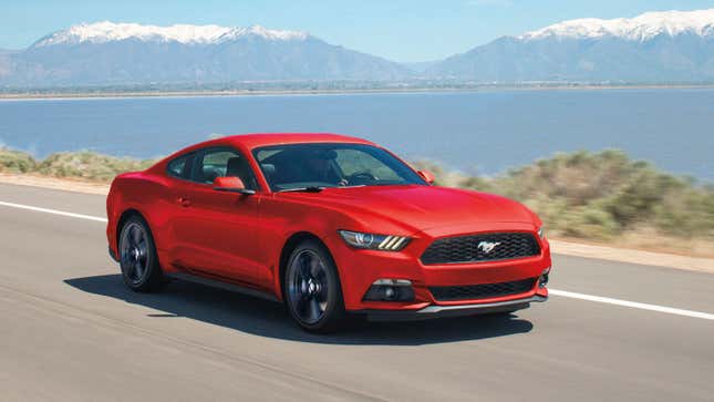 A photo of a red Ford Mustang muscle car. 