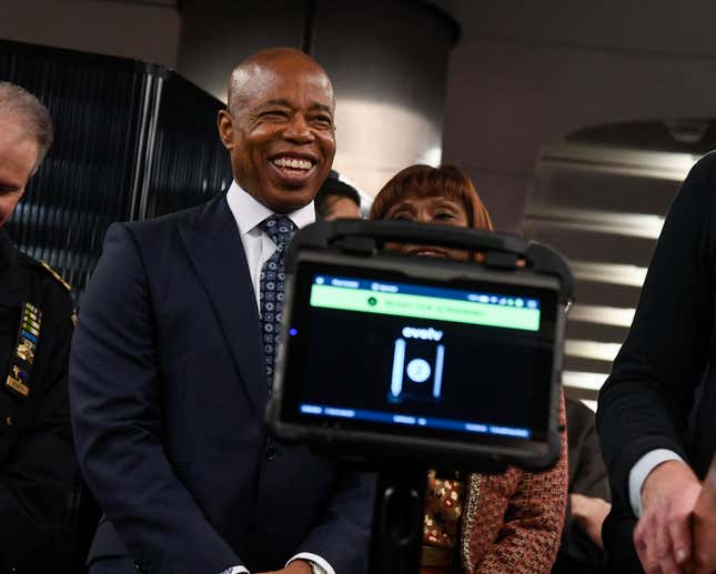 In this photo provided by The Metropolitan Transportation Authority (MTA), Mayor Eric Adams smiles during a news conference about new portable weapon detectors in New York, March 28, 2024. New York City officials announced a pilot program on Thursday to deploy portable gun scanners in the subway system, part of an effort to deter violence underground and to make the system feel safer. (Marc A. Hermann/Metropolitan Transportation Authority via AP)