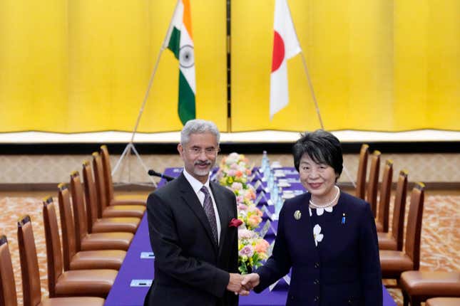 Indian Foreign Minister Subrahmanyam Jaishankar, left, and his Japanese counterpart, Yoko Kamikawa, shake hands before their meeting at Iikura Guest House Thursday, March 7, 2024, in Tokyo. (AP Photo/Eugene Hoshiko)