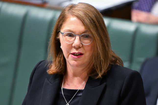 Australian Infrastructure Minister Catherine King speaks during question time in Parliament House in Canberra, Thursday, Sept. 7, 2023. King has said invasive gynecological examinations conducted on 13 passengers at Doha&#39;s international airport in 2020 was part of the reason she refused to allow Qatar Airways to double its services to Australia. (Lukas Coch/AAP Image via AP)