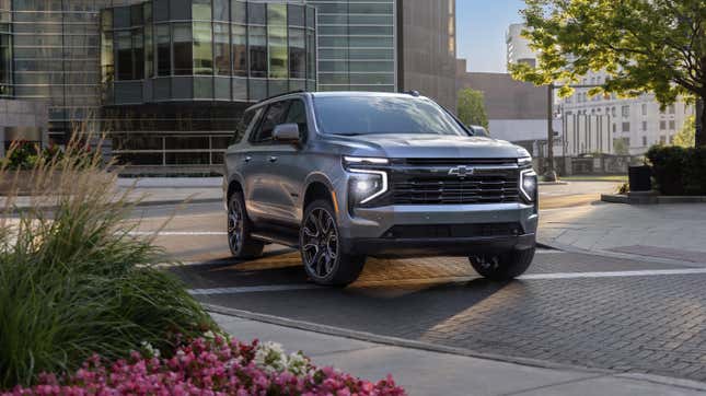 A grey Chevrolet Tahoe on a city street