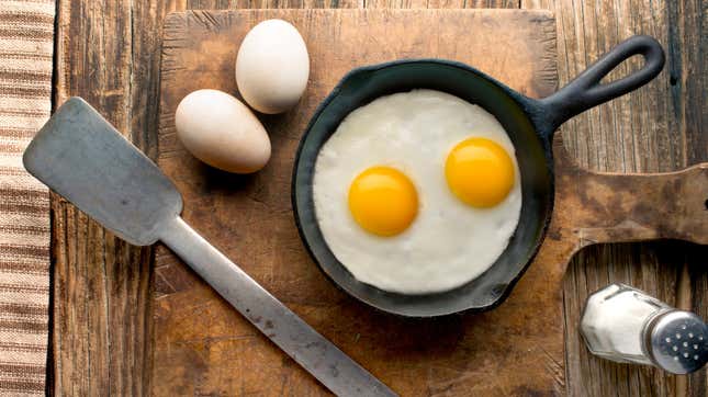 Two fried eggs in a pan