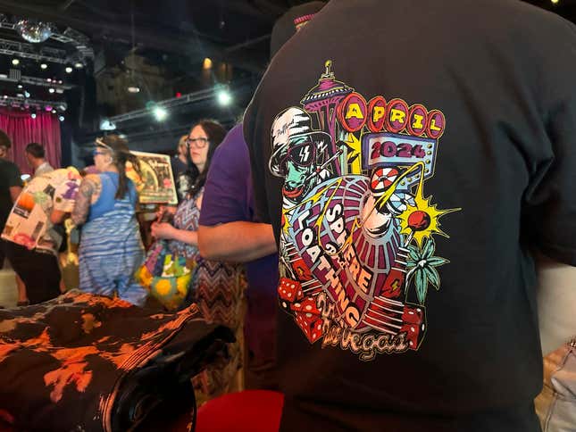 This photo during PhanArt shows a Hunter S. Thompson-inspired &quot;Sphere and Loathing in Las Vegas&quot; shirt created by artist Sean Marmora on Saturday, April 20, 2024, at the Brooklyn Bowl in Las Vegas. The shirt is in celebration of Phish&#39;s four-night residency at the Sphere. (AP Photo/Josh Cornfield)