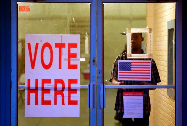 A voter exits a polling station at the National Guard Military Base during the presidential primary in Camden, Alabama, on Super Tuesday, March 3, 2020. - Fourteen states and American Samoa are holding presidential primary elections, with over 1400 delegates at stake. 