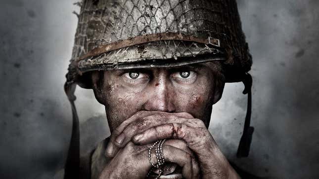 A man in a helmet stares as smoke from World War II surrounds him. 