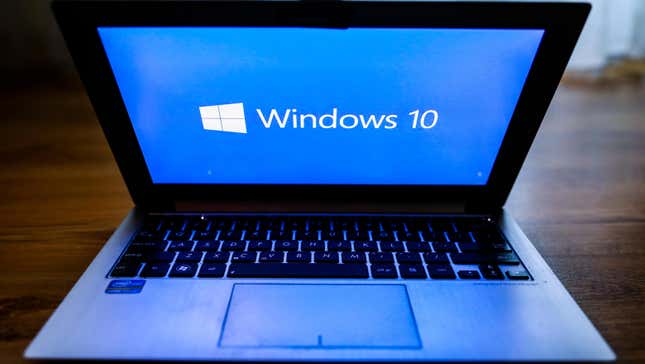 Windows 10 operating system logo is displayed on a laptop screen for illustration photo.