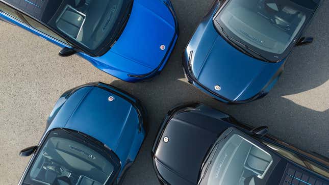 A photo of four Fisker Ocean electric cars. 