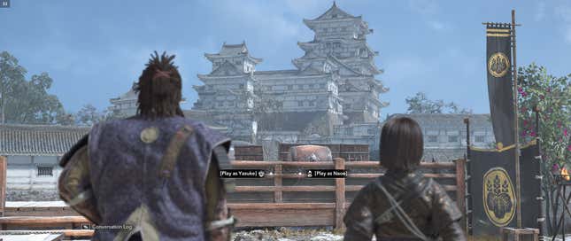 Yasuke and Naoe stare out at a large fuedal Japanese castle.