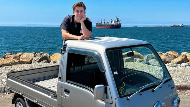 An image posted to Twitter of YouTuber Ludwig Ahgren standing in the bed of his 1997 Subaru Sambar.