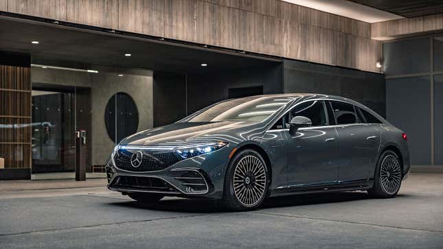 A photo of a dark grey Mercedes EQS sedan. 