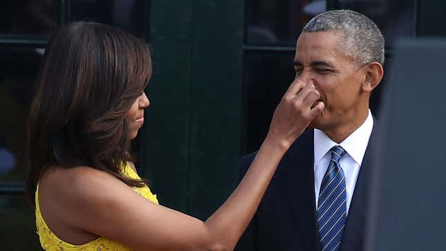 First lady Michelle Obama and U.S. President Barack Obama on the South Lawn of the White House August 2, 2016 in Washington, DC.