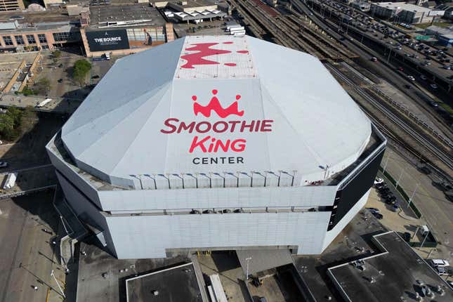 FILE - An aerial overall exterior view of the Smoothie King Center appears before an NBA basketball game between the New Orleans Pelicans and the San Antonio Spurs in New Orleans, March 20, 2023. The Pelicans and Smoothie King have agreed to renew their arena naming rights contract, the club announced Tuesday, Dec. 26. (AP Photo/Tyler Kaufman, File)