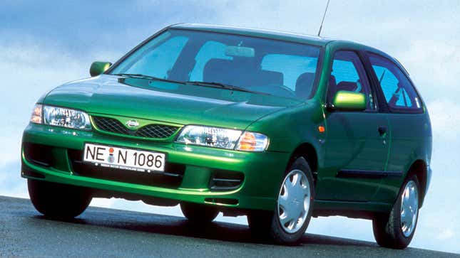 A green Nissan Almera Hatchback