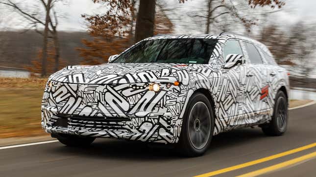 Camouflaged Acura ZDX EV prototype