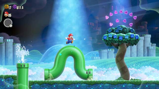 Mario rides a green pipe. 