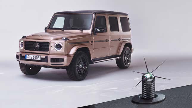 Front 3/4 view of a rose gold Mercedes-Benz G-Class