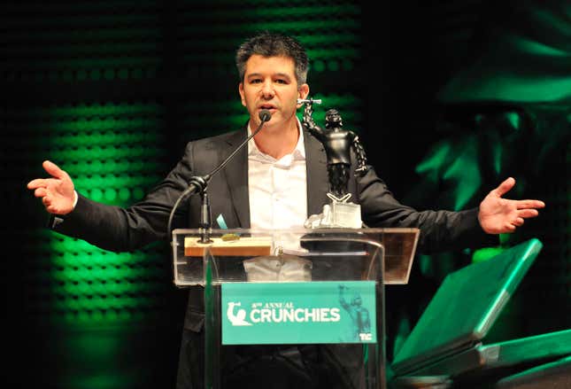 Travis Kalanick accepts an award