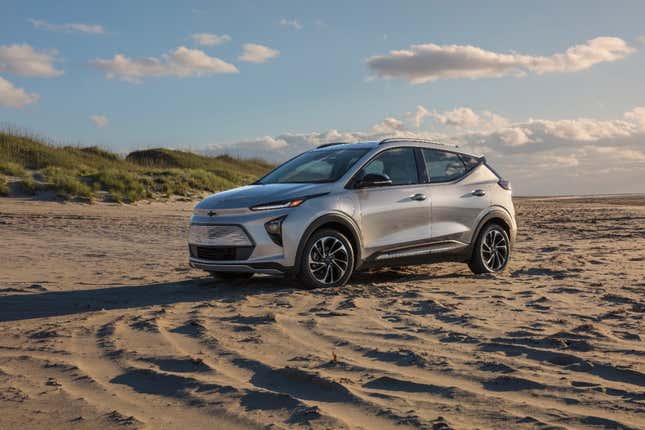 A Chevy Bolt EUV parked on a beach 