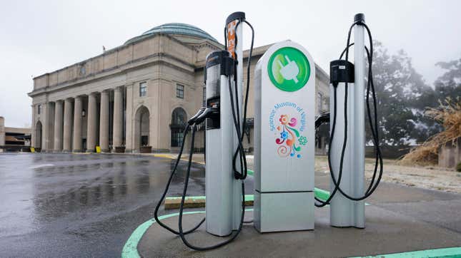 An electric car charging station is positioned outside the Science Museum in Richmond, VA.
