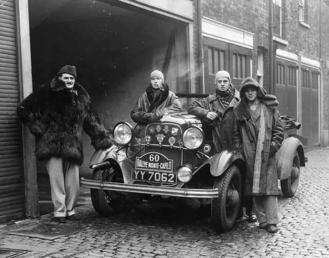 16th January 1934: Major JA Driscoll, dressed in a fur coat, in London with his crew and car before setting off for the Monte Carlo motor rally. (Photo by General Photographic Agency/Getty Images)