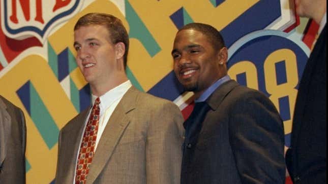 Peyton Manning and Charles Woodson on NFL Draft day, 1998.