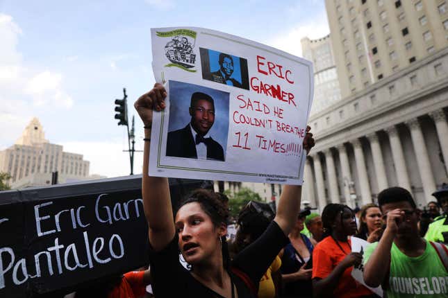 People participate in a protest to mark the five year anniversary of the death of Eric Garner during a confrontation with a police officer in the borough of Staten Island on July 17, 2019, in New York City.