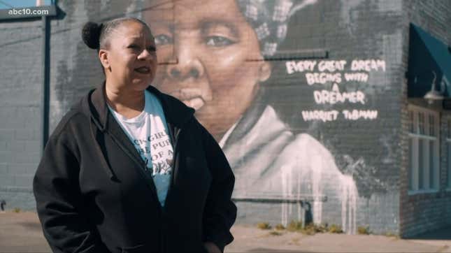 Black Lives Matter Sacramento founder Tanya Faison speaks to reporters about plans for land that the organization purchased with donations from the community.