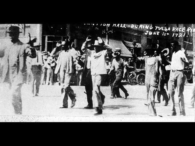 Black detainees are led to Convention Hall following the 1921 massacre in Tulsa, Oklahoma,