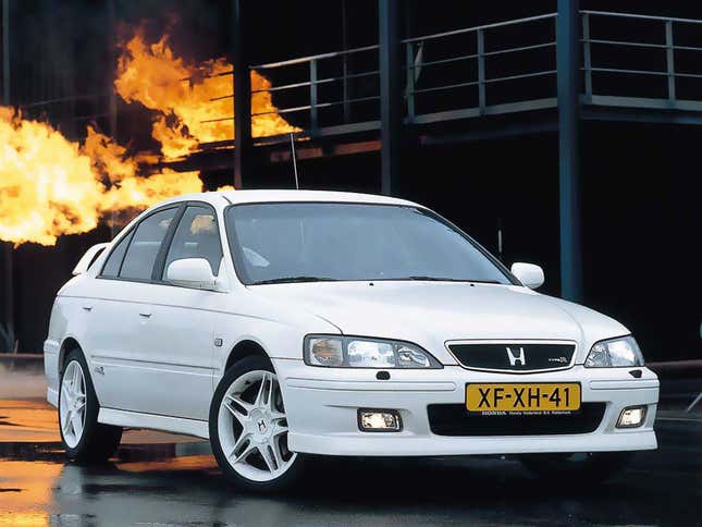 Front 3/4 view of a white Honda Accord Type R