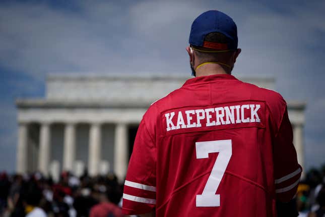 A man wears a Colin Kaepernick jersey during the March on Washington at the Lincoln Memorial August 28, 2020 in Washington, DC.