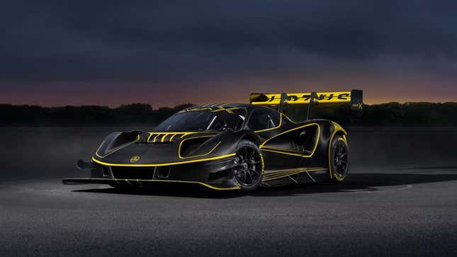 A photo of the black and yellow Lotus Evija X. 