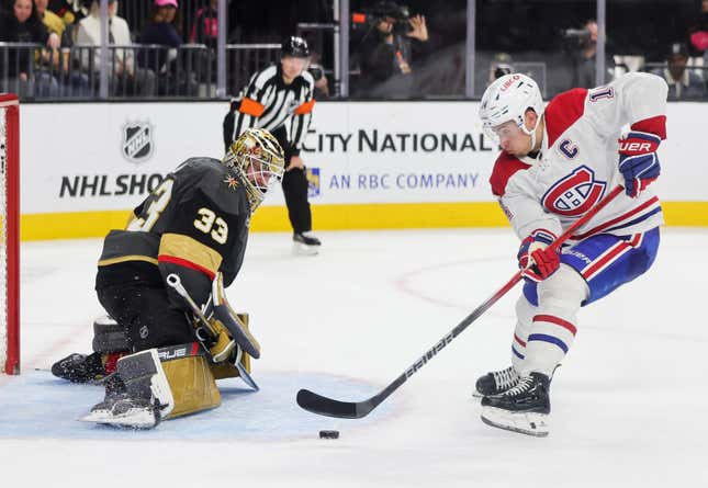 LAS VEGAS, NEVADA - OCTOBER 30: Nick Suzuki #14 of the Montreal Canadiens scores a shootout goal against Adin Hill #33 of the Vegas Golden Knights in overtime of their game at T-Mobile Arena on October 30, 2023 in Las Vegas, Nevada. The Golden Knights defeated the Canadiens 3-2 in a shootout. (Photo by Ethan Miller/Getty Images)