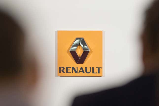 FILE - This Feb. 12, 2015 file photo shows the logo of French car maker Renault seen in a press conference held in Paris, France. Renault is setting out ambitious goals for its new combined electric vehicle and software business, saying it will “democratize” the market for battery-powered cars in Europe by making them as affordable as gasoline- or diesel-powered models within the next several years. (AP Photo/Jacques Brinon, File)