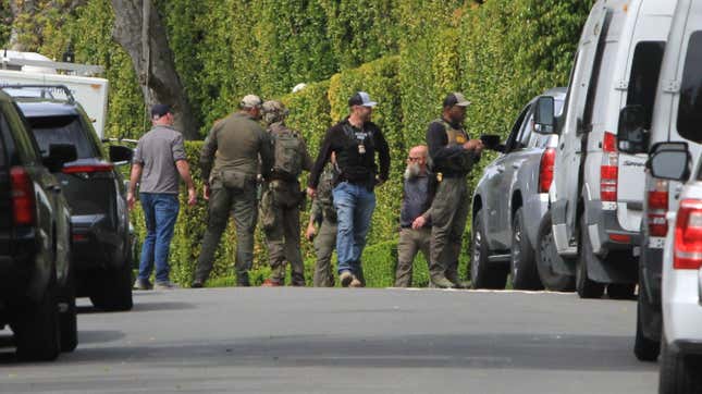 BEVERLY HILLS, CA - MARCH 25: Law enforcement agents are seen during a raid of Sean “Diddy” Combs’ home on March 25, 2024 in Beverly Hills, California. 